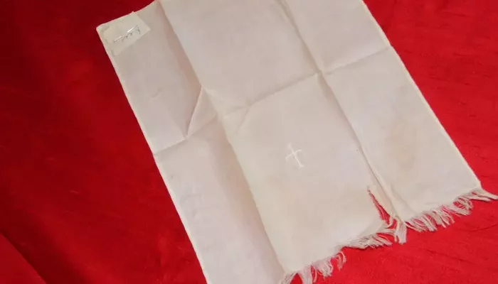Baptismal towel with tiny hand-embroidered cross