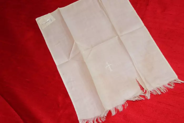 Baptismal towel with tiny hand-embroidered cross