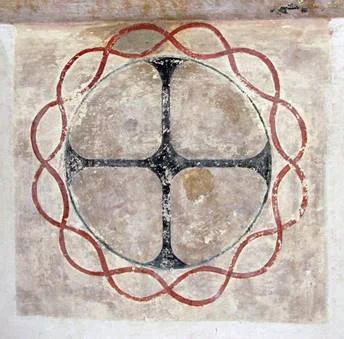 Design of a Cross in a circle surrounded by what might be a crown without the thorns
