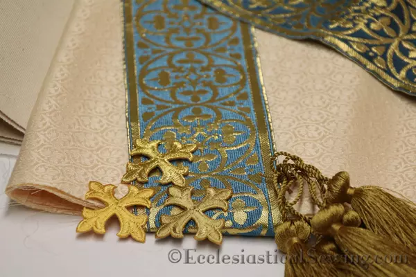 St Dominic blue tassel gold crosses on York brocade liturgical brocade fabric