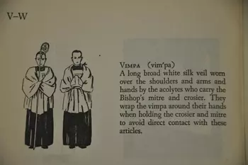 Description of Vimpae: white or silver veil worn by those carrying the mitre and crosier