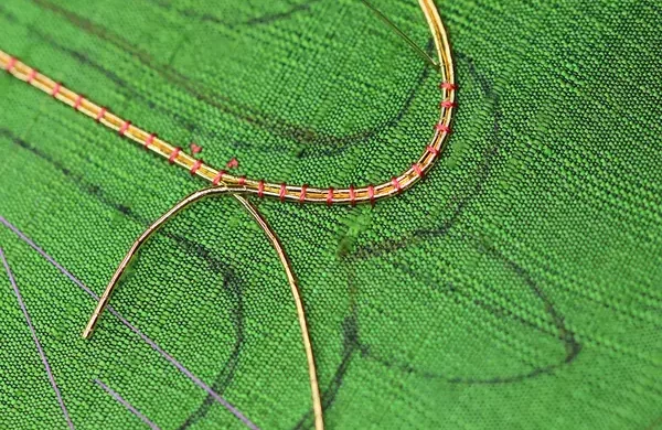 Adding the first strand of Gold Thread