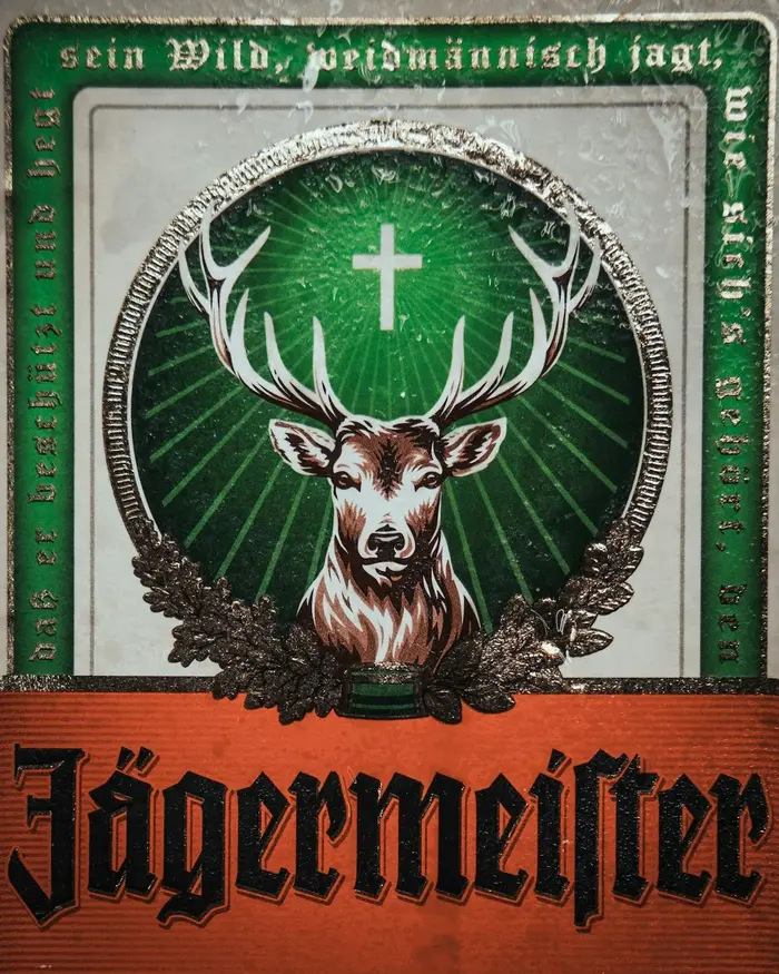 Bottle of Jägermeister, the stag and cross logo